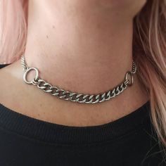 Super trendy punk style chunky chain choker necklace in silver! Thick curb chain and O ring choker necklace. Chunky yet lightweight and super comfortable to wear! Made of stainless steel so will not tarnish or discolour. Available in 2 sizes: Small: ( shown in photographs) measures 12.5 inches and comes with a 3 inch extension chain  Medium: Measures 14.5 inches and comes with a 3 inch extension chain  Please note this necklace is best worn as a tight fit. Please don't hesitate to contact me with any queries or suggestions ☺️ 💕 You will receive this necklace gift wrapped ready to give as a gift to someone special or as a special treat for yourself! 💕 Chunky Chain Stainless Steel Jewelry For Streetwear, Metal Curb Chain Necklace For Streetwear, Trendy Metal Jewelry For Streetwear, Trendy Metal Curb Chain Jewelry, Trendy Streetwear Jewelry Chain, Trendy Streetwear Chain Jewelry, Metal Curb Chain Jewelry For Streetwear, Streetwear Metal Jewelry With Curb Chain, Fashion Metal Curb Chain Jewelry