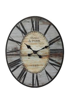 a wooden clock with roman numerals on it