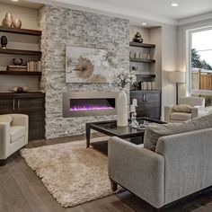 a living room filled with furniture and a fire place in the middle of the room