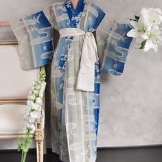 Usumono is one kind of summer kimono, with semi see through light weight and breathable fabric, which make it popular for modern day collectors for its versatility.   Handcrafted in Japan  In excellent condition, with slight sign of wearing and a few pin holes as photo indicate.  Dry Clean only  BELT NOT INCLUDED Approximate measurements for reference:  Length (along central back seam): 151cm Sleeve Length: 32cm Sleeve Width: 48cm Underarm to Underarm (top bust half circle):  59cm Left Sleeve ed Blue Kimono For Spring Tea Ceremony, Spring Kimono For Tea Ceremony, White Kimono For Spring Tea Ceremony, White Kimono For Tea Ceremony In Spring, Blue Kimono Outfit, Traditional Blue Long Sleeve Kimono, Transparent Kimono, Blue Kimono Traditional, Kimono Textile Pattern