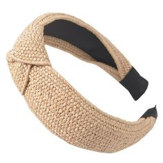 the headband is made out of woven material and has black rubber band on it