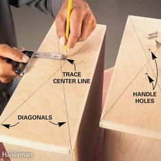 a person is using a pair of pliers to cut the sides of a piece of wood