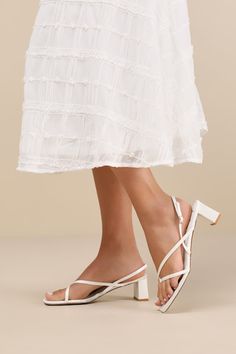 Subtly sultry and always chic, the Lulus Kerrie White Satin Strappy Low Heel Sandals will add a luxe to touch to any ensemble! Sleek woven satin shapes these unforgettable heels that have a square footbed, a thong-style upper, and a network of slender straps throughout. A matching, adjustable slingback strap secures with a shiny gold buckle, all atop cute block heel. 2" wrapped block heel. Cushioned insole. Felted rubber sole has nonskid markings. Man made materials. Imported. Lulus | Kerrie White Satin Strappy Low Heel Sandal Heels | Size 6. Low Heel Sandals, Cute Heels, Sandal Heels, Wedding Sandals, Cute Sandals, Heel Sandal, Slingback Sandal, White Satin, Heel Sandals