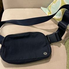 Lululemon Everywhere Belt Bag. Took It Out Only Once For Less Than 2 Hours. In Brand New Condition. No Flaws, No Odors, No Stains, No Damages. Color: True Navy Original Strap Version, Not Extended Version. No Returns. No Refunds. Blue Lululemon Belt Bag, Sporty Blue Belt Bag, Functional Lululemon Belt Bag For On-the-go, Lululemon Belt Bag With Zipper Pocket For On-the-go, Lululemon Belt Bag, Sporty Nylon Belt Bag For On-the-go, Lululemon Everywhere Belt Bag, Everywhere Belt Bag, Navy Color