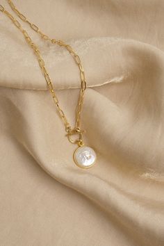 "Necklace details: - 18K Gold Filled Paperclip chain - Chain link size: Approx. 6mm x 4mm - Freshwater Pearl size: Approx. 10mm - Gold Filled Toggle Bar: 11.4mm - Gold Filled Toggle Outer Ring: 9mm - Model wears 18\" L necklace *NOTE: For your information, necklace length is the total length of the finished product. It is not just the chain. For example, if you would like to have 17\" necklace, we make 17\" total length including the toggle clasp so the chain itself will be shorter than 17\" the Necklace Set Gold, Chain Layering, Choker Gold, Square Necklace, Pearl Necklace Set, Toggle Necklace, Gold Pearl Necklace, Gold Necklace Set, Necklace Pearl