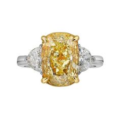 An exquisite glamour design, so chic and refined, in 18k gold with a stunning GIA certified natural fancy yellow diamond of 5.00 carats, VS2 clarity, in cushion cut, and two side natural diamonds, in half moon cut of each 0,60 carats x 2, with a total 1,20 carats, top quality. Complete with GIA report. Handcrafted by artisan goldsmith. Excellent manufacture and quality. Whosale price. Note: have available pickup taxes free for European customers and for Asiatic customers. Send a private message . Yellow Diamond Engagement Ring Cushion, Radiant Diamond Engagement Rings, Yellow Diamond Ring, Cushion Diamond Ring, Half Moons, Yellow Cushion, Yellow Diamonds Engagement, Yellow Diamond Engagement Ring, Fancy Light