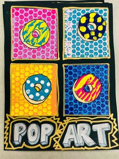 an art project with four different paintings and the words pop art