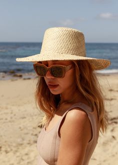 Our Catalina is a short-brim straw hat featuring a woven trim, a perfect sunny-weather staple. Ideal for those long days of sunlight featuring afternoons picnics and everything in-between. Lightweight Made from Straw *Sizes vary but measure about S/M: 21 IN M/L: 23 IN Spring Coastal Boater Hat Made Of Toquilla Straw, Classic Woven Straw Hat, Lightweight Straw Hat For Day Out, Beachy Panama Hat With Uv Protection For Summer, Woven Short Brim Boater Hat, Beachy Straw Hat With Uv Protection For Summer, Lightweight Beachy Panama Fedora Hat, Upf 50+ Curved Brim Hat For Picnic, Chic Toquilla Straw Hat