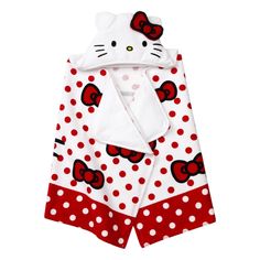 a hello kitty towel and bathrobe set on a white background with red polka dots