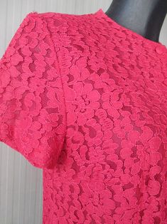 "Amazing original 50s cherry red macramè lace blouse. Round neck and front covered buttoning (pic.1). Short sleeves. Fully lined. Mint conditions. It fits size M Measurements: (lay flat and double chest) Shoulders 15.3\" chest 40.1\" sleeve length 7\" back length 21.2\" Blusa originale anni 50 in pizzo macramè color rosso ciliegia. Collo tondo e bottoncini ricoperti (foto 1). Manica corta. Foderata. Ottime condizioni. Taglia M Misure: Spalle 39 cm seno 102 cm lungh.manica 18 cm lungh. dietro 54 Formal Fitted Lace Top With Short Sleeves, Formal Fitted Short Sleeve Lace Top, Formal Short Sleeve Lace Top, Pink Short Sleeve Blouse For Formal Occasions, Fitted Vintage Lace Top With Short Sleeves, Short Sleeve Lace Top For Spring Formal, Feminine Short Sleeve Lace Blouse, Formal Short Sleeve Lace Top For Spring, Party Blouse With Lace Trim And Short Sleeves