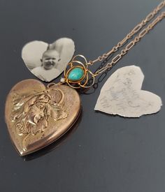 "This is a beautiful antique repousse heart shaped locket rendered in gold fill dating from the late 1800's to early 1900's. Features an exceptionally beautiful image of a ladies head with a flower. She reminds me of the Flower Fairies, as she appears to wearing the flower as a hat/bonnet. There is some age appropriate wear to the gold fill finish and there are no photo frames. The photo and handwritten note in the photo above were inside the locket when I purchased it. Locket opens closes as it Vintage Antique Gold Heart Pendant Necklace, Antique Gold Heart Pendant Vintage Necklace, Vintage Engraved Double Heart Necklace, Victorian Locket Jewelry For Valentine's Day, Victorian Locket For Valentine's Day, Vintage Double Heart Engraved Locket Necklace, Antique Heart-shaped Yellow Gold Jewelry, Vintage Rose Gold Locket Necklace For Wedding, Gold Necklace With Antique Finish For Keepsake