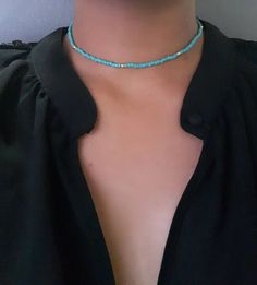 "Turquoise Choker - Seed Choker - Beaded Choker - Boho Choker - Dainty Stretch Choker - Green Turquoise Choker - Stretch Choker  * D E T A I L S * This choker is made with size 8 seed beads and is strung onto durable stretch cord. * S I Z E * It is avaliable in the following sizes: 11 inches  11.5 inches  12 inches  12.5 inches  13 inches  13.5 inches  14 inches Each choker comes with a 2\" extender chain.  * Q U E S T I O N S * If you have any questions, feel free to send me a message ❤" Cheap Blue Bohemian Choker, Turquoise Tiny Beads For Jewelry Making, Turquoise Necklace With Spacer Beads For Beach, Turquoise Necklace With Tiny Beads For Beach, Blue Turquoise Necklace With Tiny Beads For Jewelry Making, Turquoise Beach Necklace With Round Spacer Beads, Turquoise Beach Necklace With Tiny Beads, Turquoise Beaded Choker With Round Beads, Beaded Turquoise Necklace For Beach