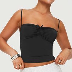 Step into summer with a splash of Y2K nostalgia in our Ruched Spaghetti Strap Camisole. This stylish piece combines vintage flair with modern fashion, making it a must-have for your warm-weather wardrobe. Whether you're catching up with friends at a café or dancing the night away at a beach party, this top will keep you looking chic and feeling comfortable. Key Features Elasticity: Medium stretch for a flattering fit that moves with you Fabric: High-quality broadcloth that's both durable and bre Catching Up With Friends, Y2k Nostalgia, Backless Crop Top, Summer Crop Tops, Contemporary Fashion, Modern Fashion, Beach Party, High Waist Jeans, Warm Weather