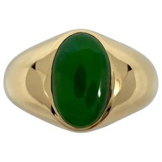 GIA Certified A-Grade Vivid Green Jadeite 18k Yellow Gold Signet Ring. A stunning 1.43 carat untreated vivid green jadeite jade set in a fine 18k yellow gold rubover bezel signet ring. This jade has an excellent oval cabochon cut showing the colour beautifully. Vivid green colour stone.Comes with GIA lab report confirming stone as natural and untreated. Beautiful vivid green colour. Please ignore the white reflections on the gemstone in the pictures, these aren't inclusions or marks, just from t Lab Report, Colour Stone, Gold Signet Ring, Green Colour, Oval Cabochon, Signet Ring, Green Colors, Jade, Jewelry Rings