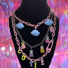 3 Layered Necklace Acrylic Chain With Clouds And The Word ‘Cutie’ On It. Bears In Silver Chain Length Is 17 Inches #Y2k #Set #Nostalgia #00s #Necklace Thanks In Advance Brand Set Vintage Nostalgia Virus Facemask Mask Top Croptop Skirt Pink Aesthetic Brown Inpiration Kawaii Luxury Baddieedits. Sailormoon Sailormars Sailor Playful Pink Jewelry With Adjustable Chain, Playful Pink Necklaces For Party, Pink Dangle Charm Necklace With Adjustable Chain, Pink Playful Party Necklaces, Playful Pink Necklace For Party, Playful Pink Party Necklaces, Cute Pink Jewelry With Chain Detail, Cute Pink Jewelry With Chain, Cute Pink Jewelry With Adjustable Chain