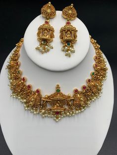 Peacock design antique with Pearls necklace set with matching long earrings Handmade item One gram gold jewelry Silver plated jewelry Official Website globusfashions.com 🌸 S H O P . M O R E . S T Y L E S 🌸 https://www.etsy.com/shop/Globusfashions Necklaces - https://www.etsy.com/shop/Globusfashions?section_id=18712263 Bracelets - https://www.etsy.com/shop/Globusfashions?section_id=18969767 Pendant Sets - https://www.etsy.com/shop/Globusfashions?section_id=18707402 Tikka - https://www.etsy.com/ Gold Kundan Necklace With Peacock Design For Celebration, Gold Kundan Necklace With Peacock Design In Chandbali Shape, Antique Festive Jewelry Sets With Intricate Design, Gold Jewelry With Peacock Design For Diwali, Ornate Kundan Necklace With Peacock Chandbali Design, Gold Jewelry With Peacock Design For Festivals, Gold Chandbali Necklaces With Peacock Design, Gold Kundan Necklace With Peacock Design For Diwali, Antique Gold Temple Necklace For Celebration