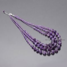 "PRODUCT DETAIL : ITEM : PURPLE AMETHYST BEADED NECKLACE ITEM CODE : DGC3037 ITEM NAME :NECKLACE GEMSTONE : PURPLE AMETHYST BEADS SHAPE : SMOOTH ROUND LENGTH : 17\"-19\" INCH APPROX BEADS SIZE: 3mm/6-12 MM Approx WEIGHT : 431 Cts. APPROX CUSTOMIZATION/BULK ORDER : AVAILABLE PLEASE FEEL FREE TO CONTACT IF YOU REQUIRE ANY FURTHER INFORMATION." Layer Beads Necklace, Beaded Necklace Purple, Halloween Beaded Jewelry, Multi Layer Necklace Beads, Necklace Amethyst, Tigers Eye Necklace, Necklace Purple, Designer Necklace, Beads Jewellery