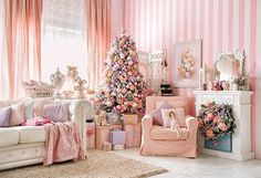 a living room filled with furniture and a christmas tree