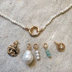 Channel your inner mermaid and feel magical. An individual charm (1 piece) of brass plated in 18K gold vermeil. Our charm is approx 1/2" in diameter and looks great added onto our Vermeil hoops and the mini pearl necklaces. Vermeil is a thicker coating of gold making this charm water resistant. All orders over $50 ship for free within the USA. All orders usually ship within 24 hours from the USA. Large Stone Necklace, Pearl Beaded Jewelry, Trending Necklaces 2024, 2024 Jewelry Trends Women, Trending Jewelry 2024, Beaded Charm Necklace, Diy Necklace Charms, Moodboard Jewelry, Charm Necklace Ideas