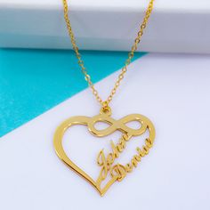 Show your love wearing our Infinite Love Pendant with two names. Whether you want to wear your kids names or you & your partners', it's a great jewelry piece to add to any collection. Perfect gift idea for her. Measures approximately 1.30" in length and height. This particular style is designed for names of up to 6 letters. No special characters or numbers allowed. Get yours today! Customized Nameplate Jewelry For Anniversary Gift, Name Lockets Gold, Custom Name Yellow Gold Jewelry For Anniversary, Elegant Personalized Necklace For Anniversary Gift, Yellow Gold Heart-shaped Jewelry With Name, Custom Name Pendant Jewelry For Anniversary, Yellow Gold Heart Jewelry With Name, Customized Heart-shaped Yellow Gold Jewelry, Customized Yellow Gold Heart Jewelry