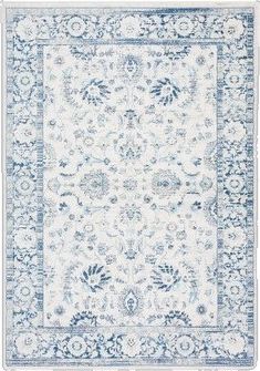 a blue and white rug with an ornate design on the bottom, in front of a white background