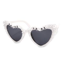 the bride to be sunglasses are decorated with pearls and heart - shaped glasses that say bride to be