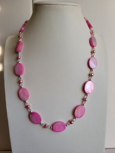 "The oval Mother-of-Pearl beads in this necklace are bright pink. It has clear ab Swarovski crystal beads and pink Freshwater pearls. The findings and remaining beads are sterling silver. It is 19.5\" long and has a 1\" extension with a beaded drop making it adjustable. Custom Orders are always welcome!" Swarovski Crystal Beads, Diy Beads, Sterling Silver Necklace, Pearl Beads, Bright Pink, Sterling Silver Necklaces, Swarovski Crystal, Crystal Beads, Custom Orders