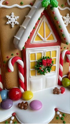 a gingerbread house decorated with candy and candies