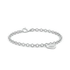 The heart-shaped charm on this 14k white gold bracelet bespeaks romantic love and classic elegance. This charm bracelet looks just as chic worn solo as it does layered with other bracelets. Classic Sterling Silver Bracelet With Charms, Elegant White Gold Heart-shaped Chain Bracelet, Elegant White Gold Heart Pendant Bracelet, Classic Gold Heart Bracelet, Classic White Gold Jewelry With Heart Charm, Elegant White Gold Chain Bracelet For Valentine's Day, Classic White Gold Heart Bracelet As Gift, Classic Sterling Silver Charm Bracelet With Heart, Classic Heart Jubilee Bracelet For Valentine's Day