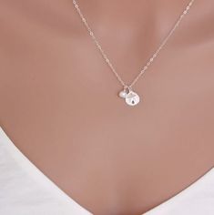 14k Gold Fill or Sterling Silver Sand Dollar and Freshwater Pearl. Beach Wedding Necklace. ★ ★★ It consists of .... -9mm 14k Gold Fill Sand Dollar Charm, -4-6mm Freshwater Pearl, -14k gold fill cable chain with spring claw. -Come up with ribbon gift box. -All quantities are available for bridesmaid gift. MORE SEA CHARM https://www.etsy.com/shop/rainbowearring/search?search_query=sea+charm&order=date_desc&view_type=gallery&ref=shop_search STERLING SILVER SAND DOLLAR https://www.etsy.c Round Charm Necklaces For Wedding, Sterling Silver White Gold Charm Necklaces With Pearl Pendant, Dainty Silver Charm Necklaces With Pearl Pendant, White Gold Sterling Silver Charm Necklace With Pearl Pendant, Delicate Silver Charm Necklace With Pearl, Minimalist Pearl Charm Necklace For Anniversary, Wedding Sterling Silver Charm Necklace, White Gold Sterling Silver Pearl Pendant Charm Necklaces, Everyday Silver Jewelry With Pearl Charm