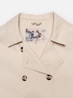 Bibbi Workwear Sailor Jacket Ecru Cotton Double-breasted Outerwear For Work, Double-breasted Cotton Outerwear With Double Button Closure, Beige Cotton Double-breasted Outerwear, Cotton Double-breasted Outerwear With Lapel Collar, Classic Cream Gabardine Outerwear, Classic Double-breasted Cotton Outerwear, Classic Cotton Outerwear With Double-breasted Button Fastening, Classic Cotton Outerwear With Double-breasted Button, Classic Khaki Outerwear With Double-breasted Button