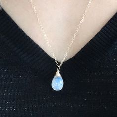 This dainty moonstone pendant necklace is gorgeous! It makes a beautiful bridesmaid gift or June birthstone gift! I wire wrap my gemstones by hand with gold filled wire for a unique look. It has beautiful flashes of blues and greens (as any quality moonstone should). It looks beautiful layered with other necklaces - check out my shop section to see some options! Shop Landon Lacey Jewelry » www.etsy.com/shop/landonlacey it's in the DETAILS . . . » 14k gold filled chain (or sterling silver) » 14k Moonstone Pendant Necklace, Layer Necklace, June Birthstone, Gold Necklace Layered, Moonstone Necklace, Moonstone Pendant, June Birth Stone, Dear Santa, Birthstone Necklace