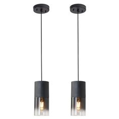 two pendant lights hanging from the ceiling with one light on each side and one light on the