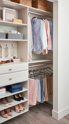 an organized closet with clothes and shoes