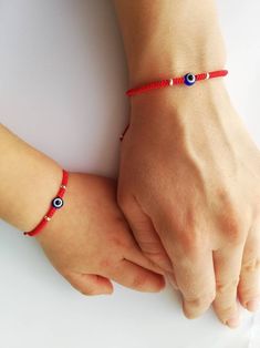 Adjustable Red Birthstone Bracelet, Handmade Red Bracelets For Birthday, Red Bracelets For Mother's Day, Red Evil Eye Bracelet Gift, Adjustable Sterling Silver Evil Eye Bracelet Gift, Red Sterling Silver Jewelry For Friendship, Mom Dad And Baby, Eye Motif, Personalized Best Friend Gifts