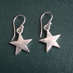 Star Earrings,Geometric Earrings,Boho Earrings,Star Dangle Drop Earrings,Brass Earrings,Tribal Earrings,Ethnic Earrings,Gifts for her Metal:- Brass HandmadeJewelry ❥ Customer satisfaction is our biggest priority, please contact us with any questions/queries for future or existing orders, and we will do our best to make sure you are happy with your order. ❥Please make sure to add the correct address during check out. You can return your purchased item within 15 days after successful delivery. We offer a 100% "Money Back Guarantee" if you are not satisfied with your purchase. Return charges will be paid by buyers only! ❥ Please share your numbers (in personalization box ) as required for shipping address details, and it'll help us to contact you easily. And don't worry about the privacy, we' Sterling Silver Star Charm Drop Earrings, Handmade Silver Star Earrings, Star-shaped Earrings For Pierced Ears As A Gift, Handmade Star-shaped Festival Earrings, Handmade Star-shaped Earrings For Gift, Handmade Star Earrings For Festivals, Bohemian Star-shaped Nickel-free Earrings, Star-shaped Nickel-free Plug Earrings As Gift, Star-shaped Pierced Earrings As Gift