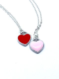 Description This tiny heart necklace is minimalistic and beautiful! Choose a pink or red heart as a symbol of your love that she can wear all the time. The heart hangs on a delicate sterling silver chain. Just choose the length. This necklace would make a lasting and memorable gift for Valentine’s Day, an anniversary, a birthday or anytime you want to let someone know they are loved! Connect Let’s stay in touch: Sign up for my VIP list for coupons, to be the first to see new releases and to be e Double Heart Charm Necklace For Friendship, Tiny Heart Pendant Jewelry For Valentine's Day, Valentine's Day Silver Charm Necklace With Delicate Chain, Friendship Necklace With Heart Pendant And Charm, Friendship Necklace With Heart Pendant, Valentine's Day Necklace With Heart Charm For Friendship, Dainty Friendship Necklaces For Valentine's Day, Valentine's Day Tiny Heart Pendant Jewelry, Friendship Dainty Necklace For Valentine's Day