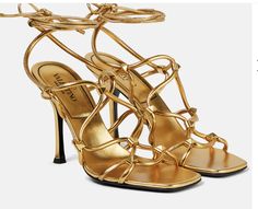 Luxury Single Toe Strap Lace-up Sandals For Spring, Luxury Leather Lace-up Sandals With Heel Strap, Designer Gold Sandals With Square Toe, Elegant Square Toe Lace-up Sandals For Formal Occasions, Luxury Open Toe Lace-up Sandals, Luxury Lace-up Sandals With Heel Strap, Elegant Gold Leather Lace-up Sandals, Luxury Open Toe Lace-up Sandals For Party, Luxury Lace-up Open Heel Sandals For Formal Occasions