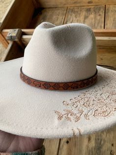 * Handmade by a small business in Texas * Measures 0.5" x 20" * Adjustable to fit the crown of your hat * Made with quality materials * Perfect for rodeos, shows, or just adding a touch of western to your hat! * Check out other hat band designs in my Etsy shop! Brown Adjustable Mini Hat With Short Brim, Adjustable Brown Mini Hat With Short Brim, Adjustable Country Hat With Flat Crown, Adjustable Country Style Hat With Flat Crown, Adjustable Brown Mini Hat With Flat Brim, Country Style Adjustable Fedora With Flat Crown, Brown Adjustable Mini Hat With Curved Brim, Adjustable Brown Mini Hat With Curved Brim, Adjustable Cream Hat For Western-themed Events