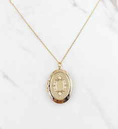 "Large Locket necklace, oval Locket necklace, gifts for her, birthday gift, vintage look locket, gold plated locket necklace, jewelry, gifts *Large Oval shaped locket suspended on dainty gold plated cable chain *Oval locket pendant is approx 1.25\", inside size is approx 7/8\" *Chose your perfect length SHIPPING: *Free domestic shipping on all orders PACKAGING: *All pieces come beautifully packaged, perfect for gift giving. Find more to ❤️ here: http://etsy.com/shop/thejewelrystandard" Elegant 14k Gold Oval Locket Necklace, Formal Gold Oval Locket Necklace, Dainty Gold Oval Locket Necklace, Elegant Gold Oval Locket Necklace, Timeless Oval Locket Necklace, Orders Packaging, Oval Locket Necklace, Wattpad Ideas, Locket Necklaces