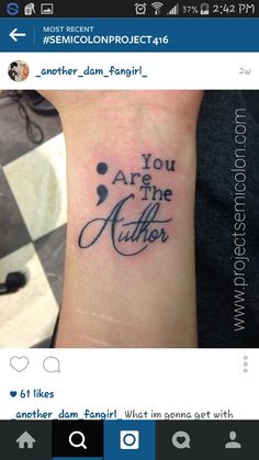 a small wrist tattoo with the words you are the author on it