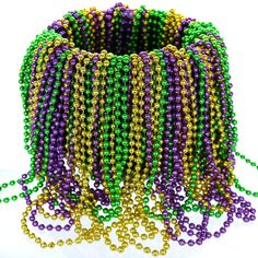 PRICES MAY VARY. What's include: 144 strands of necklaces. There are 3 metallic colors and 48 of each color: purple, gold, and green. Each necklace 33 inches long with 7mm beads. Mardi Gras Bead Necklaces Perfect for Mardi Gras parties and parades. Great Gasparilla Costume Accessory No reground material used! Non-toxic and safe! Great for all parties, carnivals, festivals and celebration events. These beads give you a best idea for party decorations and dress-ups. GiftExpress 144 pack of 33" Met Mardi Gras Float, 50th Birthday Party Decorations, Mardi Gras Beads, Mardi Gras Party, Costume Necklaces, Purple Necklace, 50th Birthday Party, Metallic Colors, Playing Dress Up