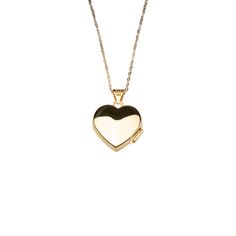 14k Heart Locket Necklace. Carry memories close with our 14k yellow gold heart locket that opens with a snap clasp to present two photos. Suspended from our signature 14k cable chain necklace, this beautiful heart locket can be engraved on the front for a personalized gift. We recommend 1 - 3 letters. Design your own engraving! Tap the button above to explore your own unique engraving options. Material: 14k Solid Gold. Dimensions: 20mm x 15mm Chain: 14k Cable Chain 14k Gold Heart Pendant Locket For Anniversary, Yellow Gold Oval Jewelry With Heart Charm, Gold Heart Locket Necklace 14k, Gold 14k Locket Heart Necklace, 14k Gold Heart-shaped Locket, Heart Cut Locket For Anniversary Gift, 14k Gold Heart Locket Jewelry, 14k Gold Heart Pendant Keepsake Jewelry, Heart-shaped 14k Gold Locket