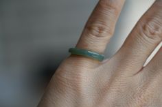 "♡This is a Natural Grade A Guatemala Glutinous Ice blue Jadeite ring (has a certification in China). ♡This is a finished product, you can get the style and color from the picture. ♡ The ring Size: US 4（ Inside diameter about15mm). The ring Width 3.2mm: ♡Please note the original colors may be a little bit different from what you see on your monitor. ♡the shop preferential policies: 1. All items are free shipping using FedEx (As long as the city can be transported by FedEx, It can be basically gu Spiritual Jade Jewelry For Anniversary, Untreated Jade Jewelry For Gift, Round Untreated Jewelry As A Gift, Handmade Jade Jewelry For Weddings, Minimalist Jade Jewelry As A Gift, Handmade Jade Jewelry For Anniversary, Round Jade Jewelry Gift, Spiritual Jade Jewelry For Weddings, Green Round Minimalist Jewelry