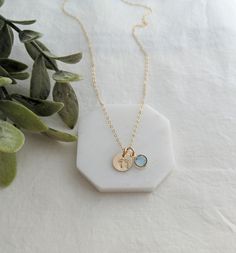 "So simple and tiny. The perfect \"wear it everyday\" necklace for the new mom or mom to be. The petite 3/8 inch charm has been hand stamped with a tiny footprint design. Includes one Swarovski crystal birthstone. Available in sterling silver or 14k gold fill. Chain length and birthstone month can be selected at checkout. ♥For more designs please visit my shop http://www.thestampedlife.etsy.com" Dainty Hand Stamped Charm Necklaces For Everyday, Dainty Hand Stamped Charm Necklace For Everyday, Small Personalized Charm Necklaces For Everyday, Personalized Small Charm Necklaces For Everyday, Dainty Stamped Charm Necklaces For Everyday, Stamped Charm Necklace For Mother's Day, Everyday Stamped Charm Necklace For Mother's Day, Mother's Day Hand Stamped Charm Necklaces, Dainty Personalized Small Charm Necklaces