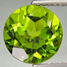 STUNNING ROUND FACETED GENUINE NATURAL PERIDOT LOOSE STONE This gorgeous stone would make a wonderful fine jewelry piece! Beautiful Round Faceted Peridot Gorgeous Apple Green Color Top Quality Gem with Astonishing Luster and Eye Clean Clarity Exquisite Gem for Fine Jewelry Take this opportunity to secure 1 or more of these marvelous gems at a well below wholesale price! This is the perfect gift for yourself or someone special. Hardness : 6.5 - 7 on Moh's Scale Specific Gravity : 3.2 - 4.3 Refrac Earth's Mantle, Stones For Jewelry, Peridot Green, August Birthstone, Tanzanite Gemstone, Loose Stones, Green Peridot, Green Sapphire, August Birth Stone