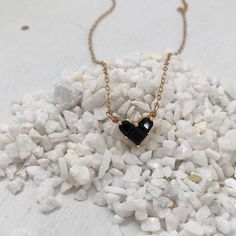 We think 2021 is the year for expressing self love. Wear our Little Black Heart Necklace as an expression that you're actively working on loving who you are in the now. Look closely and you will see that the heart is comprised of 3 separate pieces, your past, your present and your future. Gold plated charm on gold fill chain. Charm measures approximately 1/2 inch. BACK TO MY SHOP: https://www.etsy.com/shop/IsabelleGraceJewelry Cheap Black Heart Necklace As Gift, Black Heart Necklace, Jewelry Layering Necklace, Jewelry Layering, Choker Necklace Designs, Puffy Heart Charms, In The Now, Crystal Heart Necklace, Diamond Initial Necklace