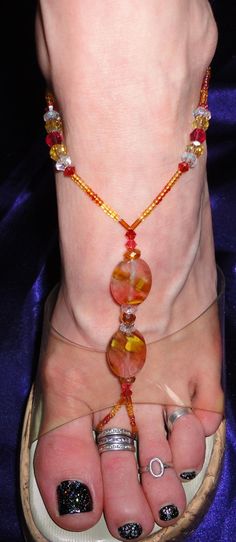 This is for a pair, one for each foot.  They are stretchy and can be worn with bare feet or with any open toed shoes.  To wear with shoes, put the ankle part of the jewelry on, then your shoe, then the toe part of the jewelry on.  They dress up any open toed shoe, even flip flops.   All of the beads on these are faceted except the seed beads, so they really sparkle.  Please indicate your shoe size so that I can make sure they will fit you perfectly.  Thank you! Open Toed Shoes, Tiger Skin, Toe Ring, Foot Jewelry, Anklet Jewelry, Toe Rings, Women's Shoes Sandals, Anklets, Seed Beads