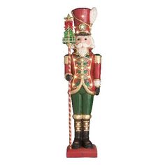 a wooden nutcracker with a green and red outfit