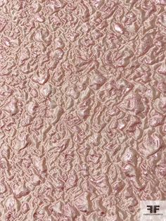 an image of a pink fabric textured with metallic foil